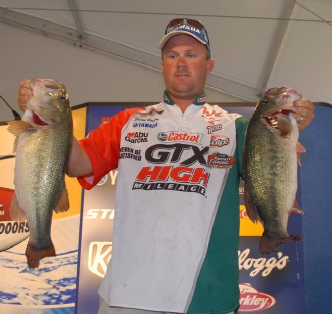 Twins: David Dudley shows off a pair of bass -- each weighing 5 pounds, 9 ounces -- which anchored his 20-pound, 2-ounce catch.