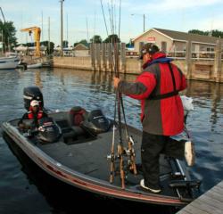 Pro Ben Felton picks up his co-angler at the start of day one.