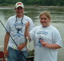 Bill Shimota and 12-year-old Mallory Glisczinski enjoy a day of catfishing on the Minnesota River.
