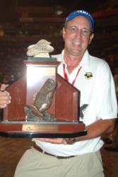 Co-angler David Hudson of Jasper, Ala., shows off his first-place trophy after winning the 2008 Forrest Wood Cup title on Lake Murray.