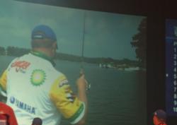 The Columbia area crowd watches the big screen as pro Mark Rose plays a fish.