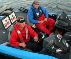 Third place pro Jason Root passes by the check out boat with his live well lids open for inspection.