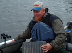 Minnesota Division boater Brian Brosdahl makes his final tackle preparations before day two. 