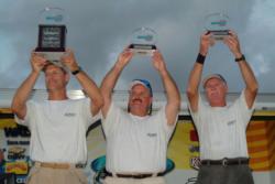 Team Kwazar members proudly display their first-place trophies. Pictured from left to right: Capt. Marcus Kennedy, Mike Ward and Max Williams.