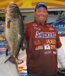 Chris Baumgardner shows off his 12-pound Falcon Lake monster, which took big bass honors for the tournament.