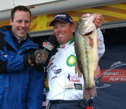 BP pro David Walker holds up a 7-pound, 7-ounce Table Rock Lake bass, the largest of the day.