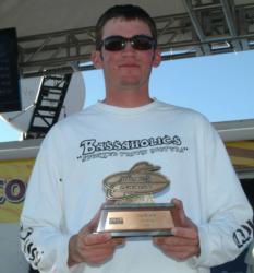 Co-angler Taylor Parsons of Sutter Creek, Calif., shows off his third-place trophy at the FLW Series event at Lake Havasu. 