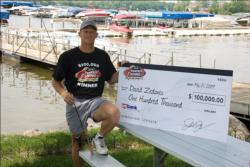 David Zedonis proudly displays his winning FLW Fantasy Fishing check.