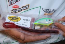 Walmart Open champion Ray Scheide shows off the two lures he plans to use today, a 12-inch Berkley Power Worm and a Bomber Fat Free Shad crankbait.