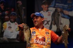 Scott Suggs shows off his fourth-place catch after the first day of 2009 Forrest Wood Cup competition.