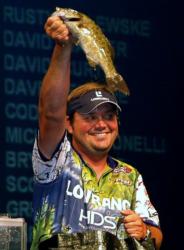 Pro winner Greg Hackney holds up his biggest bass from day four on the Three Rivers. 