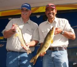 Boater Julian Jones and co-angler Tom Laveque hold up two nice Lake Wissota walleyes.