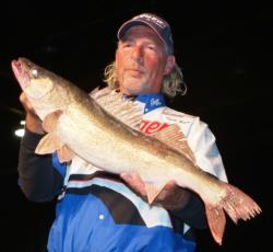 Todd Riley holds up a 9-pound kicker he caught on day one of the 2009 FLW Walleye Tour Championship.