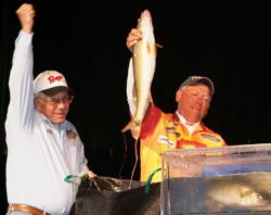 Pro Tony Renner and co-angler Lowell Joy celebrate after weighing in a 24-pound, 8-ounce limit. 