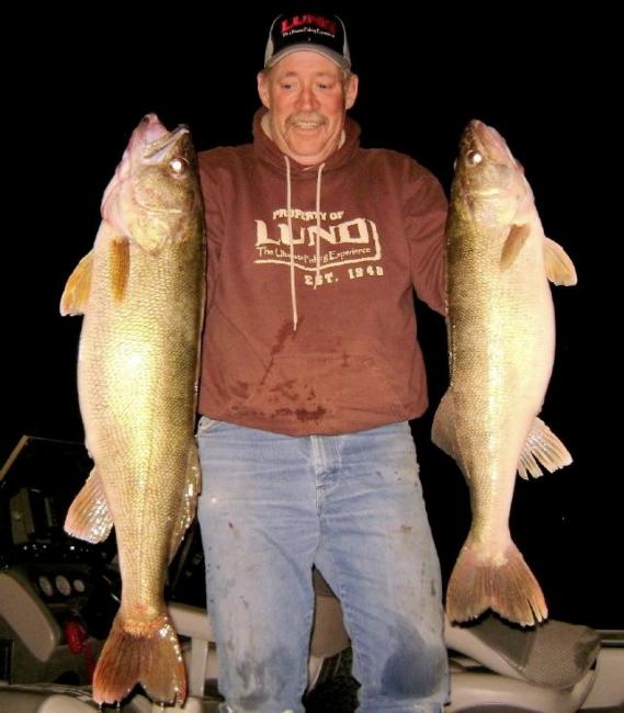 Mike Chupa of Twin Falls, Idaho, proudly displays a catch of a lifetime. Chupa netted a 17-pound, 12-ounce walleye to set the Idaho state record on Oct. 10.