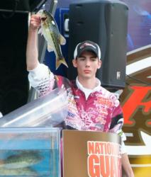 Fairmont State University angler Wil Dieffenbauch holds up a nice spotted bass he caught on day one on Lake Norman. 