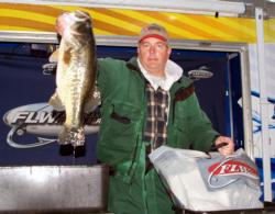 Co-angler Clint May of La Porte, Texas, leads his division on day one of the American Fishing Series event on Sam Rayburn Reservoir with three bass weighing 15-4.