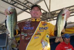 Pro Greg Pugh slipped from first to third after catching four bass Thursday that weighed 10 pounds, 8 ounces.