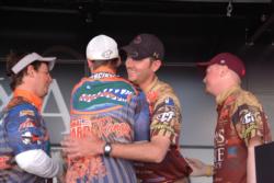 University of Florida team members receive congratulatory hugs from Texas State University after winning the 2010 FLW College Fishing National Championship.