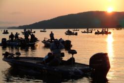 As the sun rises over Lake Ouachita, FLW Tour anglers prepare for battle.