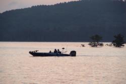 A lone FLW Tour boater makes his away across Lake Ouachita.
