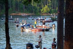 BFL All-American competitors bow their heads in prayer shortly before takeoff on day two at DeGray Lake.