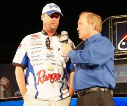 Co-angler Randy Pierson of Oakdale, Calif., is in second place with six bass weighing 13-14.