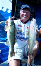 Pro Eric Olson of Red Wing, Minn., caught five walleyes weighing 15 pounds, 8 ounces Saturday to win the FLW Walleye Tour Western Division tournament on Oahe Lake. He had had a three-day catch of 15 walleyes weighing 45-7.