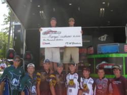 The top-five team finishers at the National Guard FLW College Fishing Southeast Division event on Lake Chickamauga acknowledge the crowd shortly after final weigh-in.