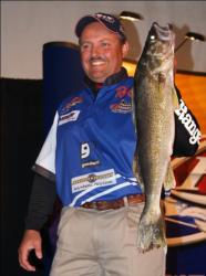 Fourth-place pro Pat Byle holds up his over from day four on Leech Lake.