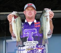 Seth Peugh shows off a pair of the bass he and partner Derek Doyle caught for Tarleton State.