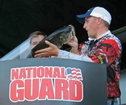 Jeff Bumgarner loads one of his two 6-pounders for NC State.