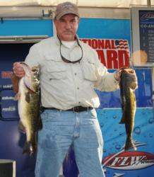 Ron Buck of Port St. Lucie, Fla., leads the Co-angler Division of the FLW Open on Lake Okeechobee with 23-12