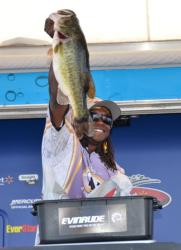 Third-place co-angler Anthony Hunt holds up his biggest from day three on Lake Okeechobee.