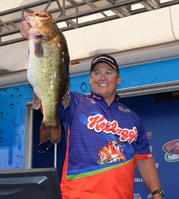 Terry Scroggins shows off a 12-pound, 2-ounce bass he caught on day four of the FLW Tour event on Lake Okeechobee.