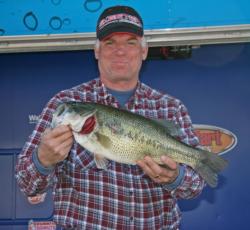 Second place co-angler Dave Epema claimed Snickers Big Bass honors with his 6-2.