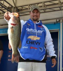 Second-place co-angler Jade Keeton holds up his kicker from Friday