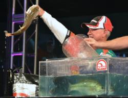 Fourth-place pro Stacey King holds up his biggest bass from day four on Lake Hartwell.