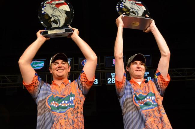 Florida Gators Jake Gipson (left) and Matthew Wercinski show off their first-place trophies after winning the 2011 National Guard FLW College Fishing National Championship.