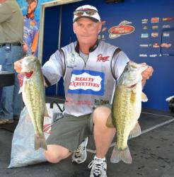 Fourth-place pro Robbie Dodson holds up two nice Chickamauga largemouths.