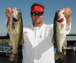 Hale White of Thompsons Station, Tenn., leads the Co-angler Division with a five-bass limit weighing 14-4.