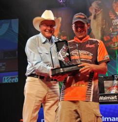 Ranger Boats founder Forrest Wood presents his namesake trophy to top co-angler Paul Mueller.