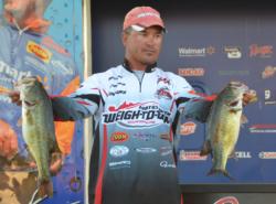 Third-place pro Troy Morrow holds up part of his day-three catch.