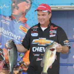 Jay Yelas shows off his 21-8 catch that put him in fifth place on day three.