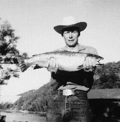 A younger Forrest L. Wood displays his catch.