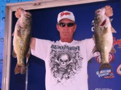 Douglas Tull of Felicity, Ohio, leads the Co-angler Division of the EverStart Series event on Lake Seminole with a five bass limit for 18 pounds.