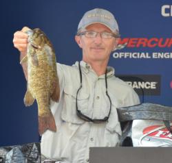 Third-place co-angler Richard Conrad holds up a nice Mississippi River smallmouth.