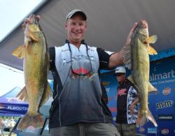 Akaska, S.D., pro Chad Schilling shows off two nice fish from his 21-pound, 8-ounce limit on day two. 
