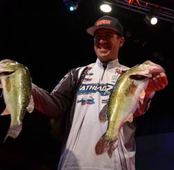 Jacob Wheeler, the 21-year-old rookie pro from Indianapolis, Ind., shows off his impressive catch of 21 pounds, 15 ounces. Wheeler