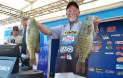 Pro leader Bill McDonald smiles as he shows off part of his 25-pound, 2-ounce stringer.